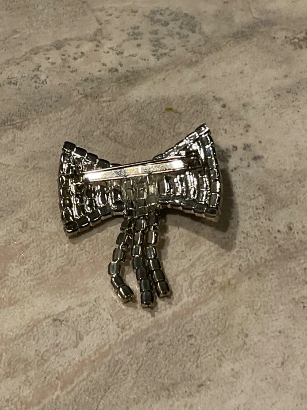 Vintage Rhinestone Bow Brooch Silvertone setting 1.5”